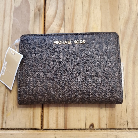 Michael Kors Handbags - Nwt hard to find Money pieces MK